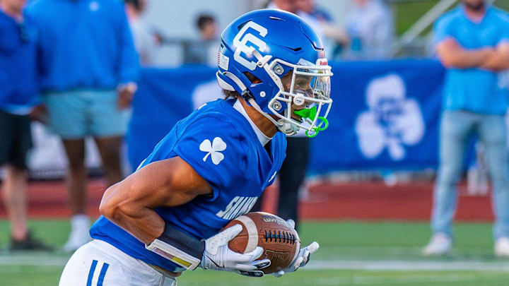 Detroit Catholic Central's Samson Gash returns a punt during a football game on Friday, Aug. 29, 2025.