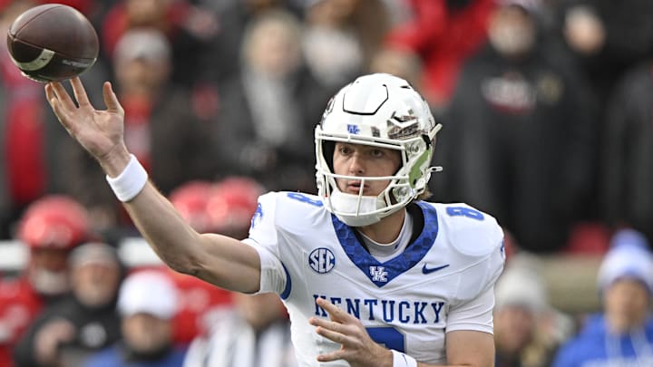 Nov 29, 2025; Louisville, Kentucky, USA;  Kentucky Wildcats quarterback Cutter Boley (8) passes the ball against the Louisville Cardinals during the first quarter at L&N Federal Credit Union Stadium. Mandatory Credit: Jamie Rhodes-Imagn Images