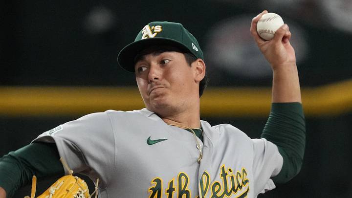 Jul 22, 2026; Phoenix, Arizona, USA; Athletics pitcher Gage Jump (61) throws a pitch against the Arizona Diamondbacks in the first inning at Chase Field. Mandatory Credit: Rick Scuteri-Imagn Images