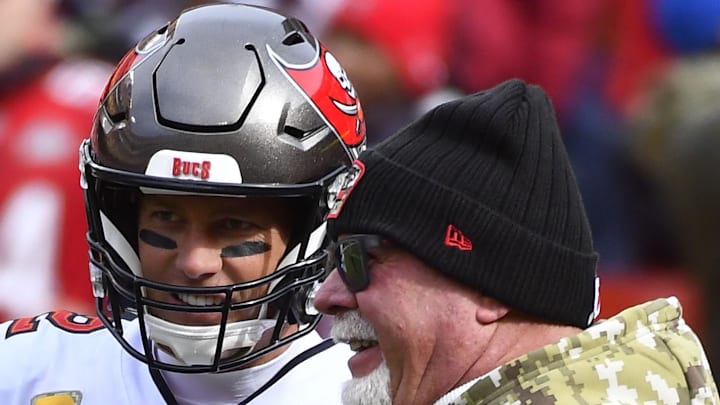 Nov 14, 2021; Landover, Maryland, USA; Tampa Bay Buccaneers quarterback Tom Brady (12) talks with head coach Bruce Arians before the game against the Washington Football Team at FedExField. Mandatory Credit: Brad Mills-Imagn Images