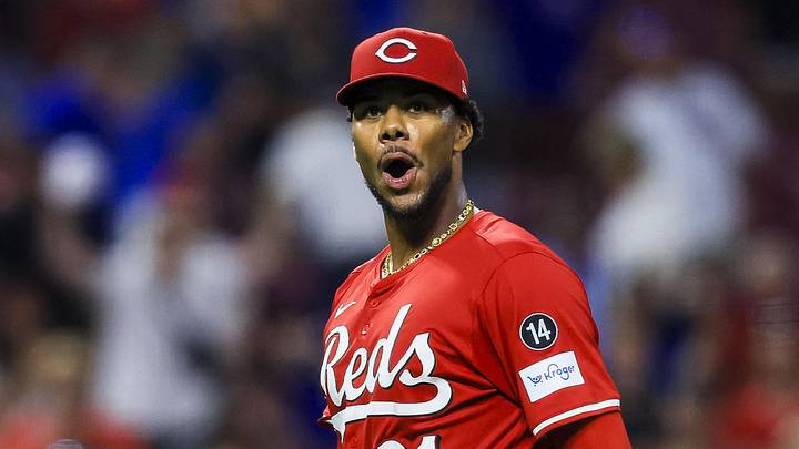 Cincinnati Reds starting pitcher Hunter Greene (21) reacts