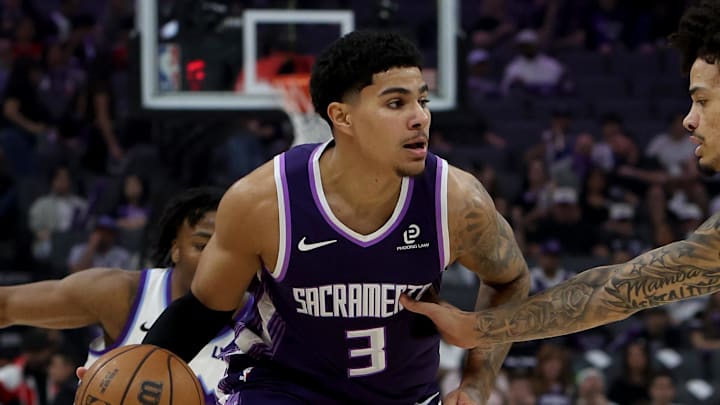 Mar 15, 2026; Sacramento, California, USA; Sacramento Kings guard Killian Hayes (3) controls the ball while being defended by Utah Jazz forward Andersson Garcia (0) during the first quarter at Golden 1 Center. Mar 15, 2026; Sacramento, California, USA; Sacramento Kings guard Killian Hayes (3) controls the ball while being defended by Utah Jazz forward Andersson Garcia (0) during the first quarter at Golden 1 Center.