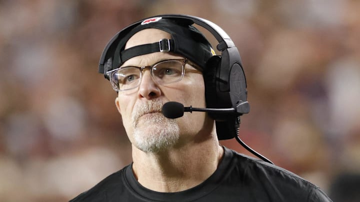 Washington Commanders head coach Dan Quinn looks on from the sidelines against the Atlanta Falcons during the second half at Northwest Stadium. Mandatory Credit: Amber Searls-Imagn Images
