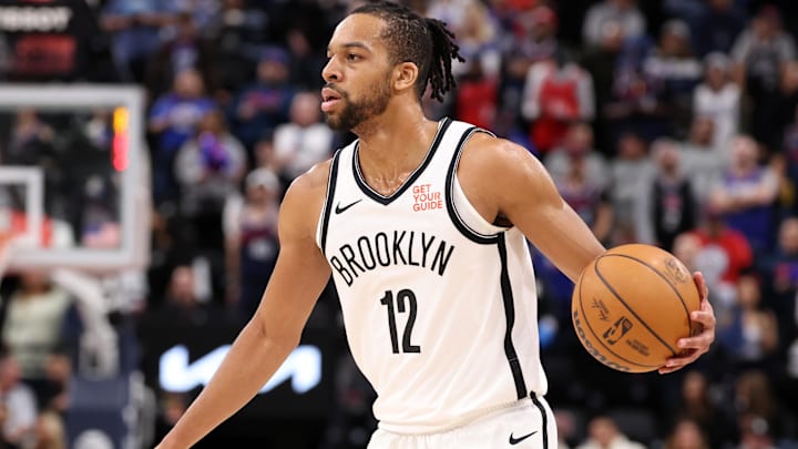 Jan 15, 2025; Inglewood, California, USA;  Brooklyn Nets forward Tosan Evbuomwan (12) dribbles during the second half against the LA Clippers at Intuit Dome. Mandatory Credit: Kiyoshi Mio-Imagn Images