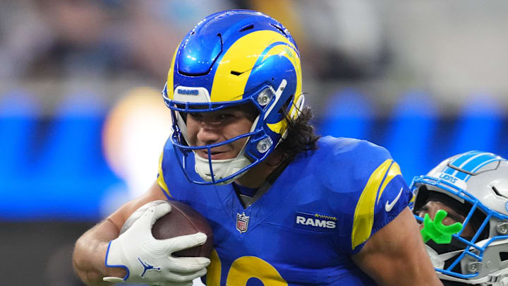 Dec 14, 2025; Inglewood, California, USA; Detroit Lions cornerback Amik Robertson (21) tackles Los Angeles Rams wide receiver Puka Nacua (12) during the fourth quarter at SoFi Stadium. Mandatory Credit: Kirby Lee-Imagn Images