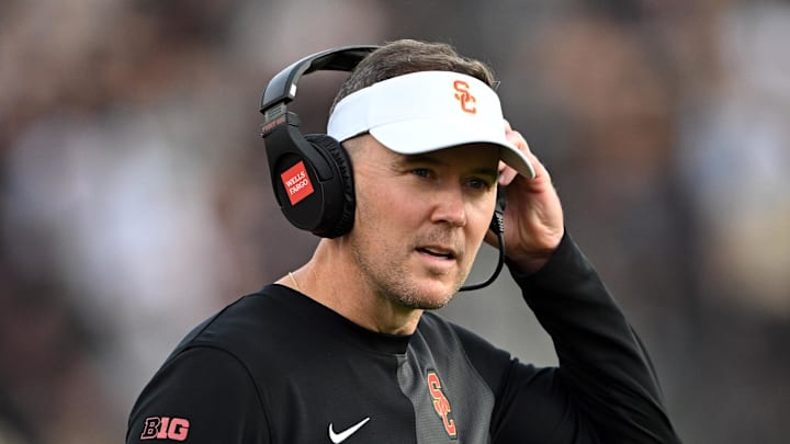 Sep 13, 2025; West Lafayette, Indiana, USA; Southern California Trojans head coach Lincoln Riley stands on the sidelines during the first quarter against the Purdue Boilermakers at Ross-Ade Stadium. Mandatory Credit: Marc Lebryk-Imagn Images