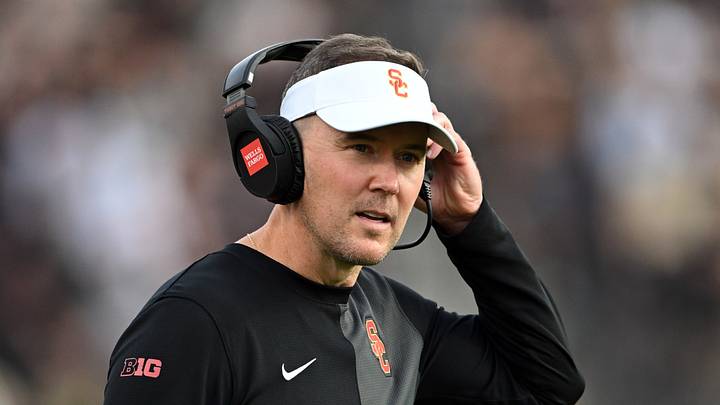 Sep 13, 2025; West Lafayette, Indiana, USA; Southern California Trojans head coach Lincoln Riley stands on the sidelines during the first quarter against the Purdue Boilermakers at Ross-Ade Stadium. Mandatory Credit: Marc Lebryk-Imagn Images Sep 13, 2025; West Lafayette, Indiana, USA; Southern California Trojans head coach Lincoln Riley stands on the sidelines during the first quarter against the Purdue Boilermakers at Ross-Ade Stadium. Mandatory Credit: Marc Lebryk-Imagn Images