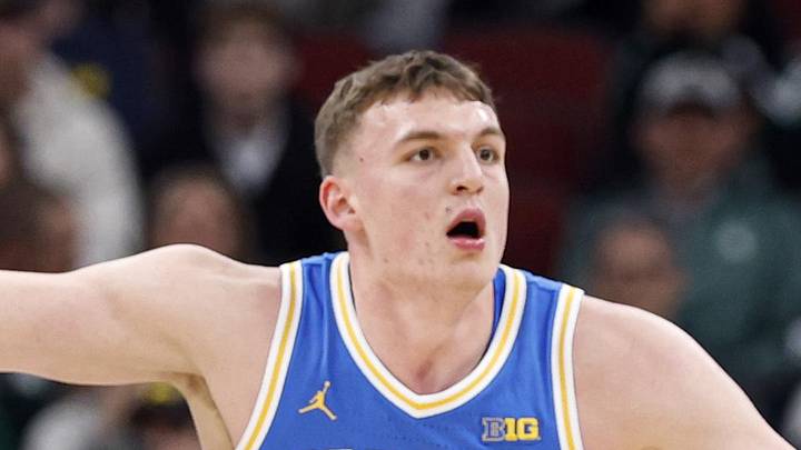 Mar 13, 2026; Chicago, IL, USA; UCLA Bruins forward Tyler Bilodeau (34) defends against Michigan State Spartans center Carson Cooper (15) during the first half at United Center. Mandatory Credit: Kamil Krzaczynski-Imagn Images