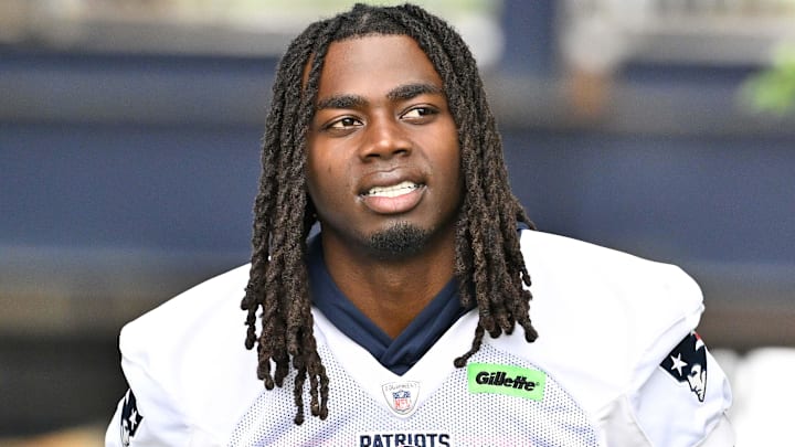 New England Patriots running back Rhamondre Stevenson (38) walks to the practice fields at Gillette Stadium.