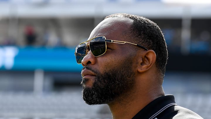 Dec 1, 2019; Jacksonville, FL, USA; Jacksonville Jaguars former running back Fred Taylor (black sun glasses) looks on prior to the game between the Jacksonville Jaguars and the Tampa Bay Buccaneers at TIAA Bank Field. Mandatory Credit: Douglas DeFelice-Imagn Images Dec 1, 2019; Jacksonville, FL, USA; Jacksonville Jaguars former running back Fred Taylor (black sun glasses) looks on prior to the game between the Jacksonville Jaguars and the Tampa Bay Buccaneers at TIAA Bank Field. Mandatory Credit: Douglas DeFelice-Imagn Images