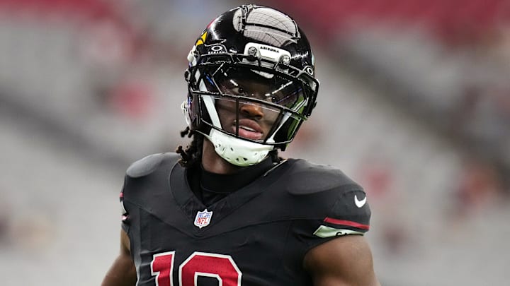 Arizona Cardinals receiver Marvin Harrison Jr. (18) warms up before their game against the Tennessee Titans at State Farm Stadium in Glendale on Oct. 5, 2025.