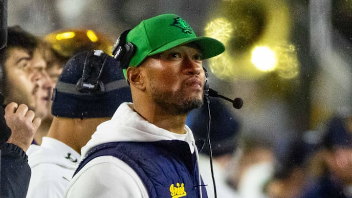 Nov 8, 2025; South Bend, Indiana, USA; Notre Dame Fighting Irish head coach Marcus Freeman looks to the scoreboard against the Navy Midshipmen during the first half at Notre Dame Stadium.