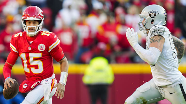Nov 29, 2024; Kansas City, Missouri, USA; Kansas City Chiefs quarterback Patrick Mahomes (15) scrambles against Las Vegas Raiders defensive end Maxx Crosby (98) during the first half at GEHA Field at Arrowhead Stadium. Mandatory Credit: Jay Biggerstaff-Imagn Images