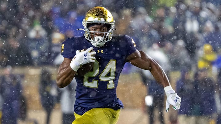 Nov 8, 2025; South Bend, Indiana, USA; Notre Dame Fighting Irish running back Jadarian Price (24) runs the ball against the Navy Midshipmen during the second half at Notre Dame Stadium. Mandatory Credit: Michael Caterina-Imagn Images