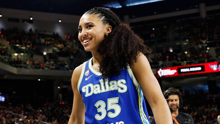 Jul 24, 2026; Chicago, IL, USA; Dallas Wings guard Azzi Fudd (35) reacts during the 2026 State Farm WNBA 3-Point Contest trophy at Wintrust Arena. Mandatory Credit: Kamil Krzaczynski-Imagn Images