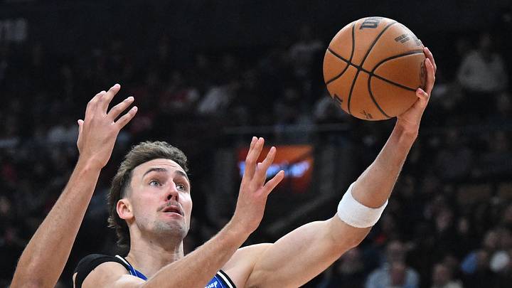 Orlando Magic forward Franz Wagner goes in for a lay up basket past Toronto Raptors forward Allen Graves. Orlando Magic forward Franz Wagner goes in for a lay up basket past Toronto Raptors forward Allen Graves.