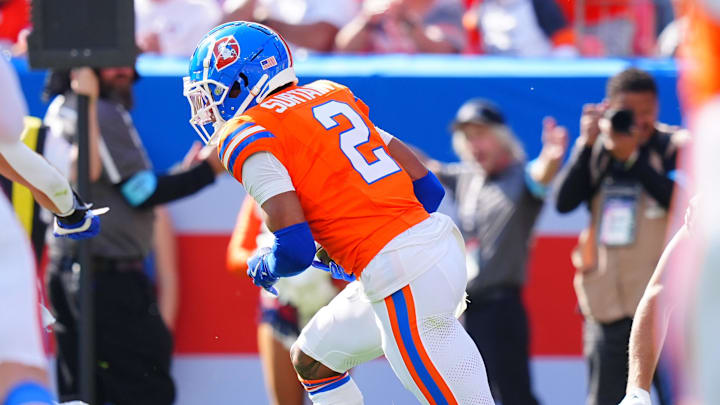 Oct 6, 2024; Denver, Colorado, USA; Denver Broncos cornerback Pat Surtain II (2) returns an interception for a touchdown against the Las Vegas Raiders in the second quarter at Empower Field at Mile High.