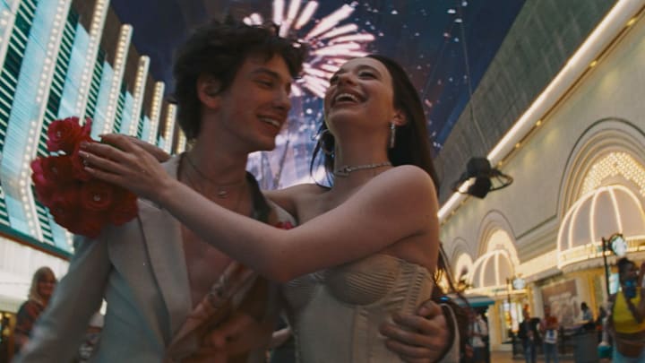 Mikey Madison as Ani and Mark Eydelshteyn as Ivan in Anora
