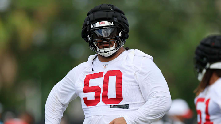 Tampa Bay Buccaneers defensive tackle Vita Vea (50) walks on the field during a combined NFL football training camp session between the Tampa Bay Buccaneers and Jacksonville Jaguars Thursday, Aug. 15, 2024 at EverBank Stadium’s Miller Electric Center in Jacksonville, Fla. [Corey Perrine/Florida Times-Union]