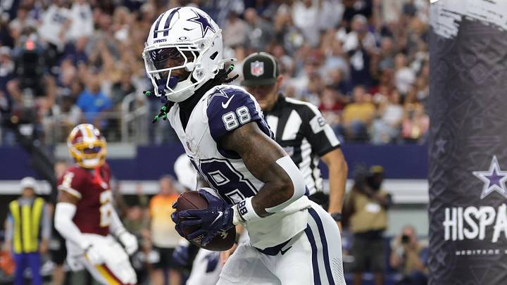 Dallas Cowboys WR CeeDee Lamb reacts after catching a touchdown pass thrown by QB Dak Prescott against the Commanders. Dallas Cowboys WR CeeDee Lamb reacts after catching a touchdown pass thrown by QB Dak Prescott against the Commanders.