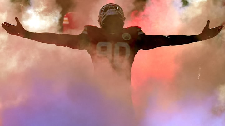 Kansas City Chiefs defensive end Charles Omenihu (90) is introduced before a game against the Los Angeles Chargers at GEHA Field at Arrowhead Stadium.