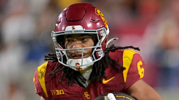 Oct 11, 2025; Los Angeles, California, USA; USC Trojans wide receiver Makai Lemon (6) takes the ball on a kickoff return in the second half against the Michigan Wolverines at United Airlines Field at the Los Angeles Memorial Coliseum. Mandatory Credit: Jayne Kamin-Oncea-Imagn Images
