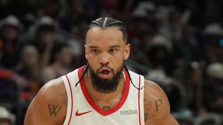 Mar 30, 2025; Phoenix, Arizona, USA; Houston Rockets forward Dillon Brooks (9) drives on the Phoenix Suns in the first half at Footprint Center. Mandatory Credit: Rick Scuteri-Imagn Images