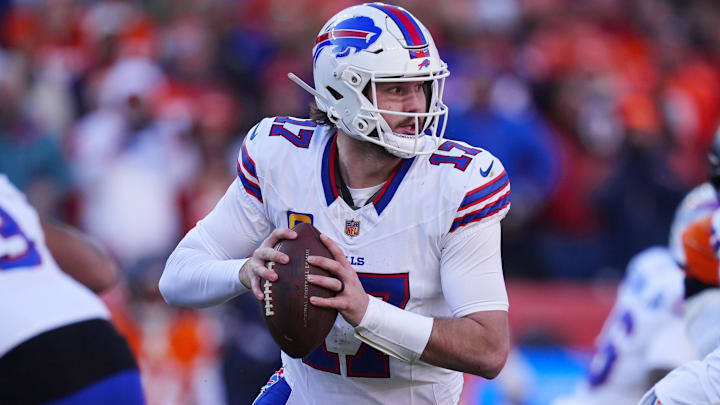 Buffalo Bills quarterback Josh Allen rolls out during the AFC Divisional Round playoff game against the Denver Broncos.