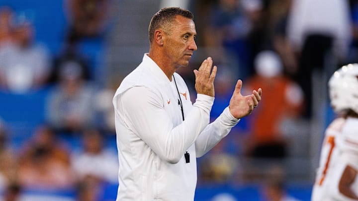 Texas Longhorns head coach Steve Sarkisian claps during warmups before the game against the Kentucky Wildcats. Texas Longhorns head coach Steve Sarkisian claps during warmups before the game against the Kentucky Wildcats.