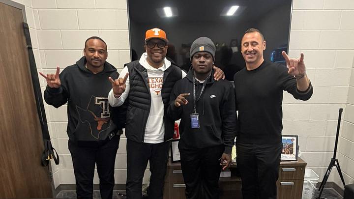 Landen Williams-Callis with the Texas Longhorns coaching staff Landen Williams-Callis with the Texas Longhorns coaching staff