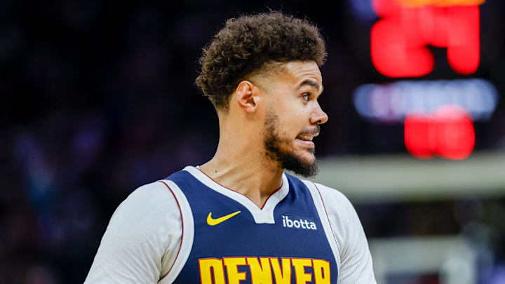Oct 23, 2025; San Francisco, California, USA; Denver Nuggets forward Cameron Johnson (23) makes a face against the Golden State Warriors  during the fourth quarter at Chase Center. Mandatory Credit: Bob Kupbens-Imagn Images