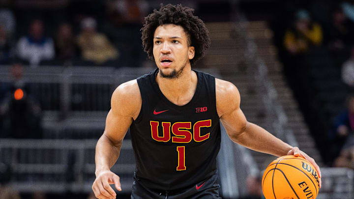 Mar 12, 2025; Indianapolis, IN, USA; USC Trojans guard Desmond Claude (1) dribbles the ball in the first half against the Rutgers Scarlet Knights at Gainbridge Fieldhouse. Mandatory Credit: Trevor Ruszkowski-Imagn Images Mar 12, 2025; Indianapolis, IN, USA; USC Trojans guard Desmond Claude (1) dribbles the ball in the first half against the Rutgers Scarlet Knights at Gainbridge Fieldhouse. Mandatory Credit: Trevor Ruszkowski-Imagn Images