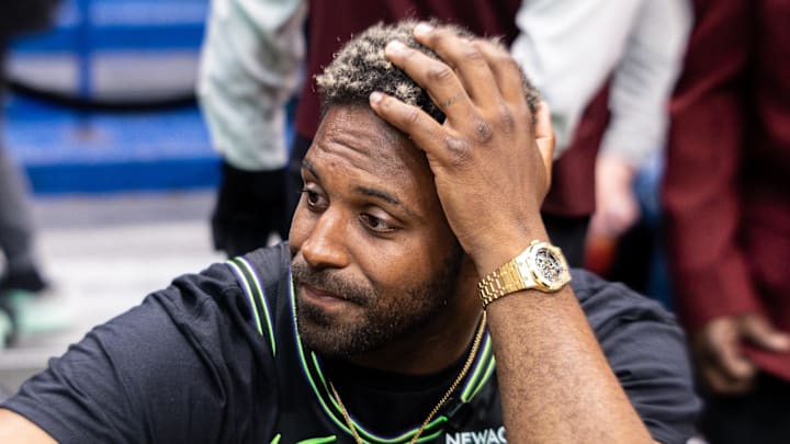 Mar 29, 2026; New Orleans, Louisiana, USA;  New Orleans Saints defensive end Cam Jordan looks on against the Houston Rockets during the first half at Smoothie King Center. Mandatory Credit: Stephen Lew-Imagn Images