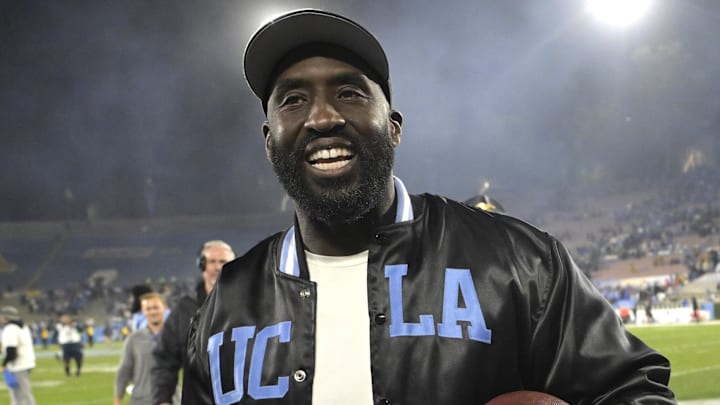 Nov 8, 2024; Pasadena, California, USA;  UCLA Bruins head coach DeShaun Foster leaves the field with the game ball after defeating the Iowa Hawkeyes at the Rose Bowl. Mandatory Credit: Jayne Kamin-Oncea-Imagn Images