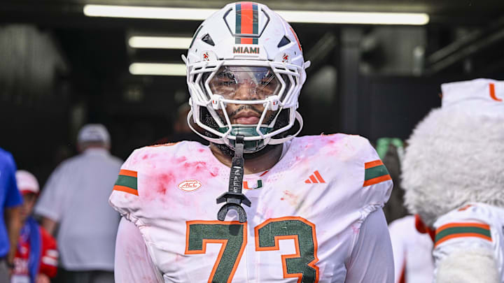 Miami Hurricanes offensive lineman Anez Cooper (73) looks on from the tunnel as the SMU Mustangs celebrate the victory over the Hurricanes during the overtime period at Gerald J. Ford Stadium.