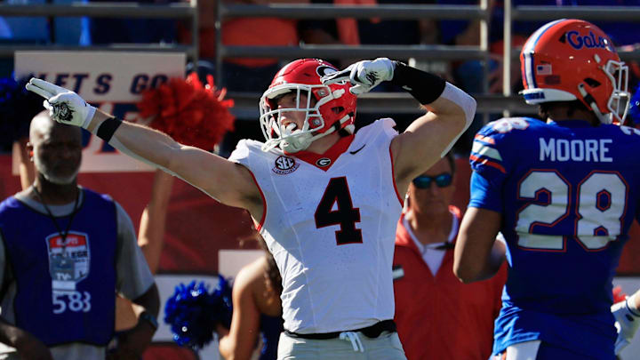 Georgia Bulldogs tight end Oscar Delp (4) indicates a first down pickup during the first quarter of an NCAA football game, Saturday, Nov. 1, 2025, at EverBank Stadium in Jacksonville, Fla. Georgia held off Florida 24-20. [Corey Perrine/Florida Times-Union]