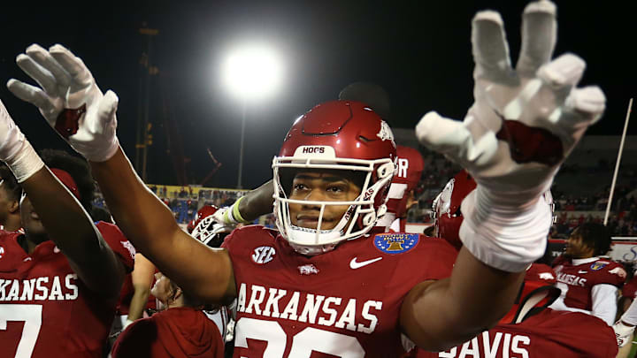 Arkansas Razorbacks linebacker Justin Logan (28) react after defeating the Texas Tech Red Raiders at Simmons Bank Liberty Stadium. 