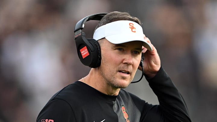 Sep 13, 2025; West Lafayette, Indiana, USA; Southern California Trojans head coach Lincoln Riley stands on the sidelines during the first quarter against the Purdue Boilermakers at Ross-Ade Stadium. Mandatory Credit: Marc Lebryk-Imagn Images