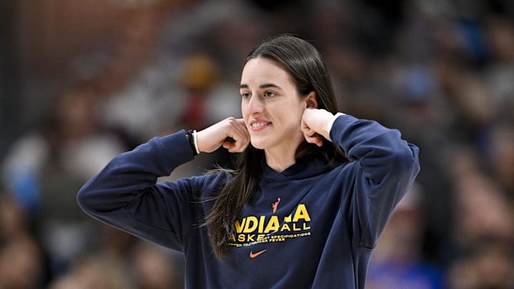 Aug 1, 2025; Dallas, Texas, USA;  Indiana Fever guard Caitlin Clark (22) walks on to the court during the second half against the Dallas Wings at the American Airlines Center. Mandatory Credit: Jerome Miron-Imagn Images