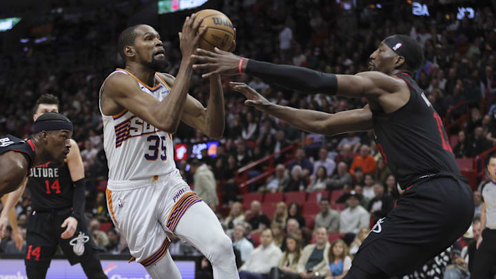 Jan 29, 2024; Miami, Florida, USA; Phoenix Suns forward Kevin Durant (35) moves to the basket against Miami Heat center Bam Adebayo (13) during the second quarter at Kaseya Center. Mandatory Credit: Sam Navarro-Imagn Images Jan 29, 2024; Miami, Florida, USA; Phoenix Suns forward Kevin Durant (35) moves to the basket against Miami Heat center Bam Adebayo (13) during the second quarter at Kaseya Center. Mandatory Credit: Sam Navarro-Imagn Images