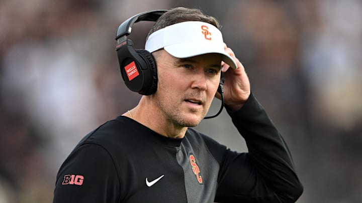 Sep 13, 2025; West Lafayette, Indiana, USA; Southern California Trojans head coach Lincoln Riley stands on the sidelines during the first quarter against the Purdue Boilermakers at Ross-Ade Stadium. Mandatory Credit: Marc Lebryk-Imagn Images