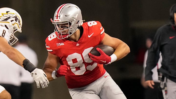 Sep 7, 2024; Columbus, Ohio, USA; DUPLICATE***Ohio State Buckeyes tight end Will Kacmarek (89) catches a a pass and runs past Western Michigan Broncos linebacker Jacob Wahlberg (8) during the first half of the NCAA football game at Ohio Stadium.