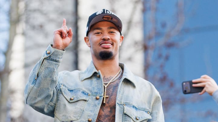 Feb 11, 2026; Seattle, WA, USA;  Seattle Seahawks wide receiver Jaxon Smith-Njigba (11) reacts during the Super Bowl LX parade.