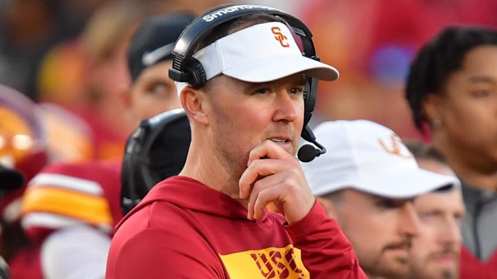 Nov 16, 2024; Los Angeles, California, USA; Southern California Trojans head coach Lincoln Riley watches game action against the Nebraska Cornhuskers during the second half at the Los Angeles Memorial Coliseum. Mandatory Credit: Gary A. Vasquez-Imagn Images