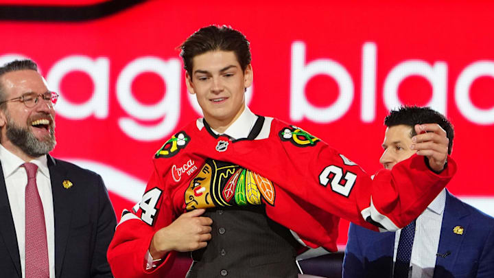 Jun 28, 2024; Las Vegas, Nevada, USA; Sacha Boisvert is selected by the Chicago Blackhawks with the 18th overall pick in the first round of the 2024 NHL Draft at The Sphere. Mandatory Credit: Stephen R. Sylvanie-Imagn Images Jun 28, 2024; Las Vegas, Nevada, USA; Sacha Boisvert is selected by the Chicago Blackhawks with the 18th overall pick in the first round of the 2024 NHL Draft at The Sphere. Mandatory Credit: Stephen R. Sylvanie-Imagn Images