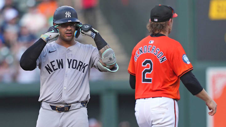 Jul 13, 2024; Baltimore, Maryland, USA; New York Yankees second baseman Gleyber Torres (25) gestures following his double in the fifth inning against the Baltimore Orioles at Oriole Park at Camden Yards.
