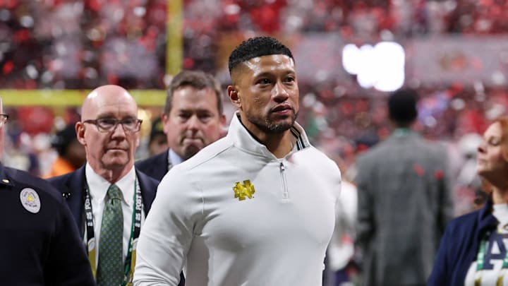 Jan 20, 2025; Atlanta, GA, USA; Notre Dame Fighting Irish head coach Marcus Freeman reacts after losing against the Ohio State Buckeyes in the CFP National Championship college football game at Mercedes-Benz Stadium. 