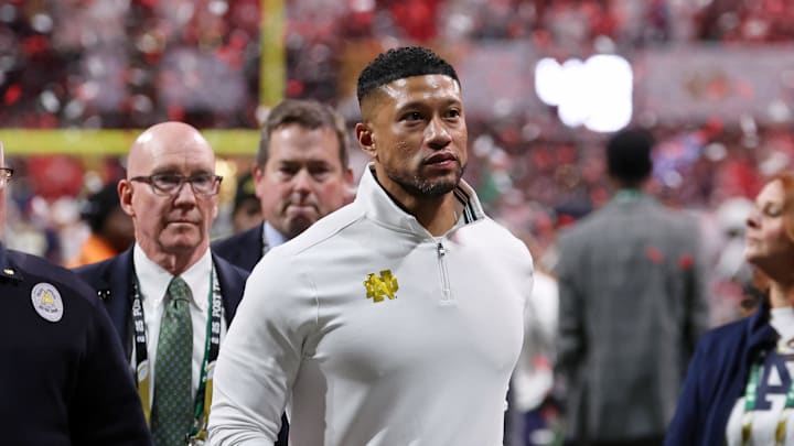 Jan 20, 2025; Atlanta, GA, USA; Notre Dame Fighting Irish head coach Marcus Freeman reacts after losing against the Ohio State Buckeyes in the CFP National Championship college football game at Mercedes-Benz Stadium. 