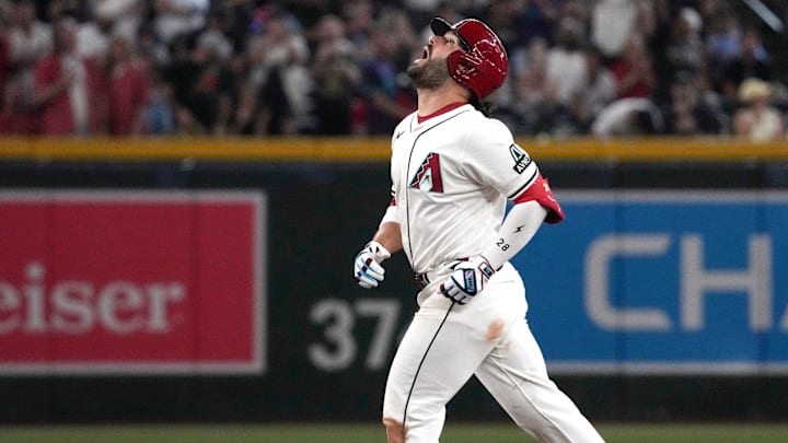 Jul 19, 2025; Phoenix, Arizona, USA; Arizona Diamondbacks third base Eugenio Suarez (28) reacts after hitting a solo home run against the St. Louis Cardinals in the third inning at Chase Field. Mandatory Credit: Rick Scuteri-Imagn Images