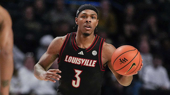 Feb 7, 2026; Winston-Salem, North Carolina, USA; Louisville Cardinals guard Ryan Conwell (3) brings the ball up court against Wake Forest Demon Deacons forward Juke Harris (2) during the second half at Lawrence Joel Veterans Memorial Coliseum. Mandatory Credit: Jim Dedmon-Imagn Images